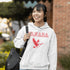 This hoodie celebrates the Canadian goose, wings spread wide, flying across Canada (and probably plotting its next lawn invasion).